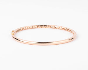 bracelet jonc ouvrant en or rose serti de 3 lignes de diamant
