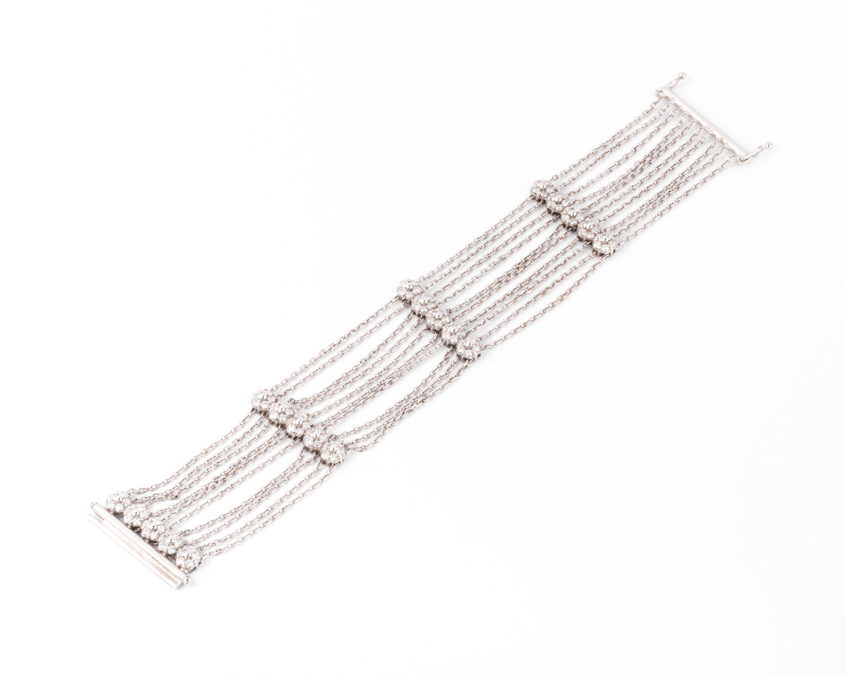 Bracelet or gris et diamant sur chaine força limée alternée de 4 motifs avec des fleurs