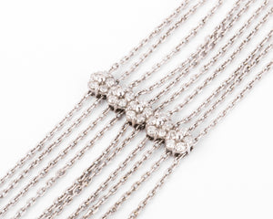 Bracelet or gris et diamant sur chaine força limée alternée de 4 motifs avec des fleurs