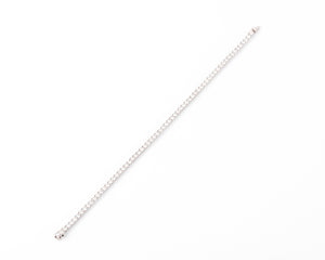 Bracelet ligne en diamant taille princesse sur or gris